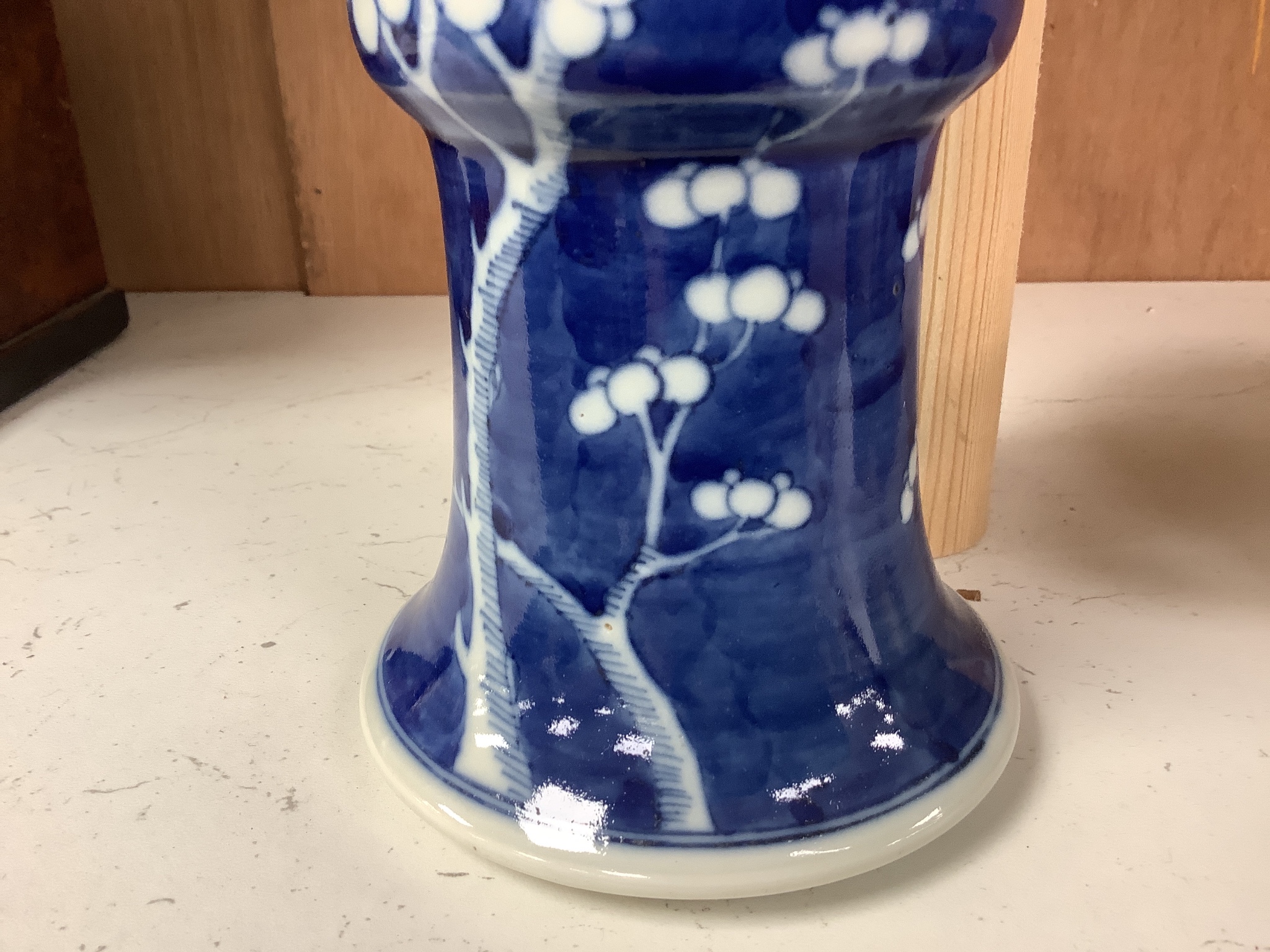 A Chinese blue and white prunus decorated gu vase, 26.5cm